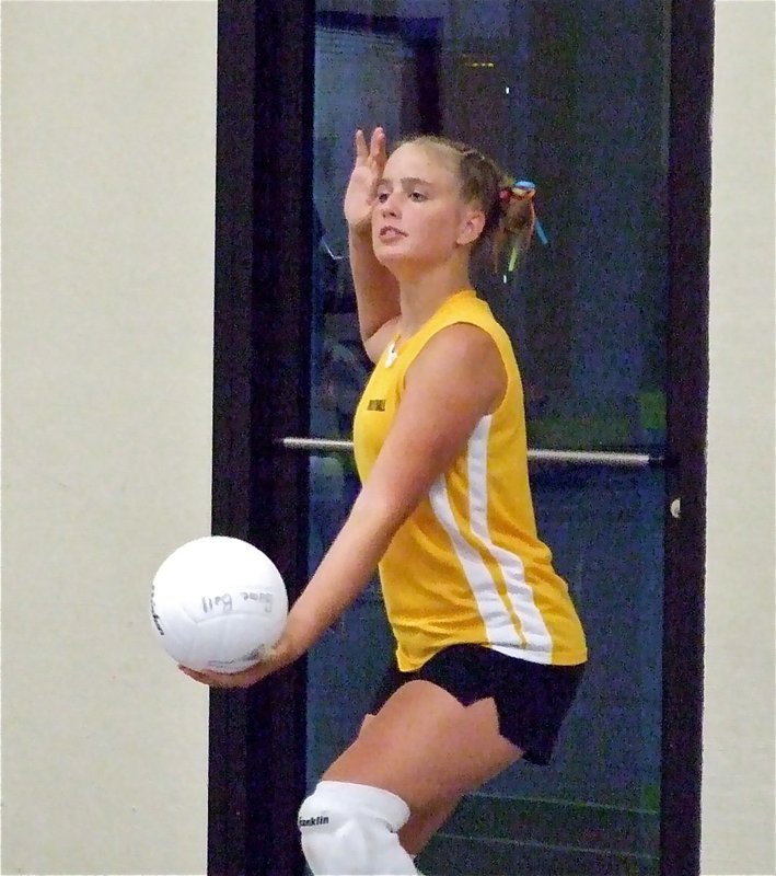 Image: Power game — Italy’s Madison Washington prepares to rocket one over the net.