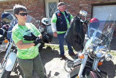 Image: Donna and Earl — Donna and Earl Goodwin, of Italy, get ready to help clear Hwy 77 of debris and discarded trash.