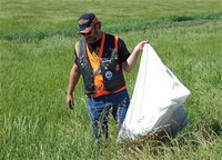 Image: Cruising along — Bobby “Trouble” Litton left his motorcycle behind to join in the Southern Cruisers Ellis County 326 Adop-a-Highway cleanup effort.