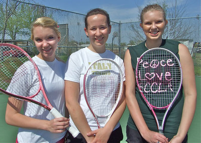 Image: Three Ultimate Warriors — Sierra Harris, Lisa Olschewsky and Megan Hopkins removed their wrestling masks to reveal their identities.