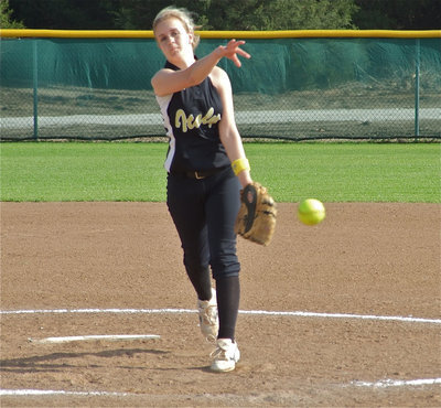 Image: Take this one! — Courtney Westbrook throws the heat.