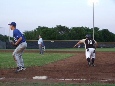 Image: Ivan takes over — Ivan Roldan is a courtesy runner for Ashcraft.