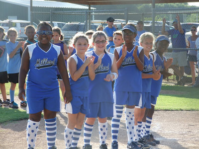 Image: Introduction please — As the Lil’ Dogs are being introduced, the excitement in the audience and the team builds.