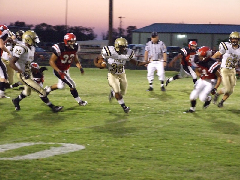 Image: Jalarnce Jamal Lewis(30) — Italy Gladiator newcomer Jalarnce Jamal Lewis #30 rushes 70-yards through the Maypearl Panther defense for a touchdown on Friday night.