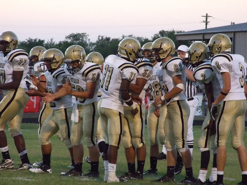 Image: Let’s do this! — The Gladiators break from their offensive huddle.