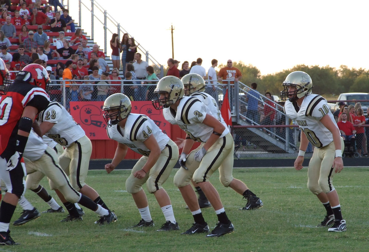 Image: Defense! Defense! — Kyle Jackson(28), Ethan Saxon(44), Colton Campbell(3), Kyle Wilkins(7) and Justin Buchanan(10) try to read Maypearl’s backfield.