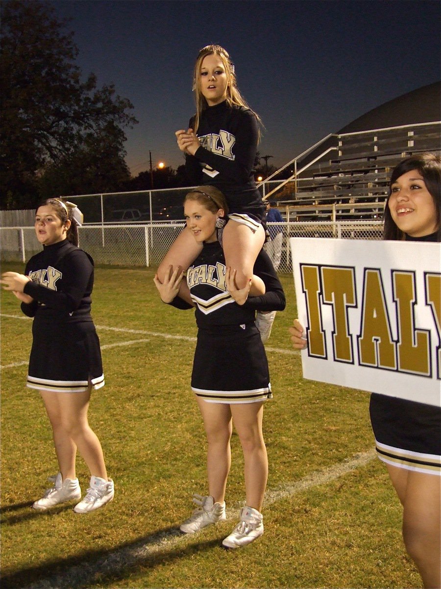 Image: I-T-A-L-Y! — Bailey, Jesica, Monserrat and Haylee (top) shout, “Italy!”