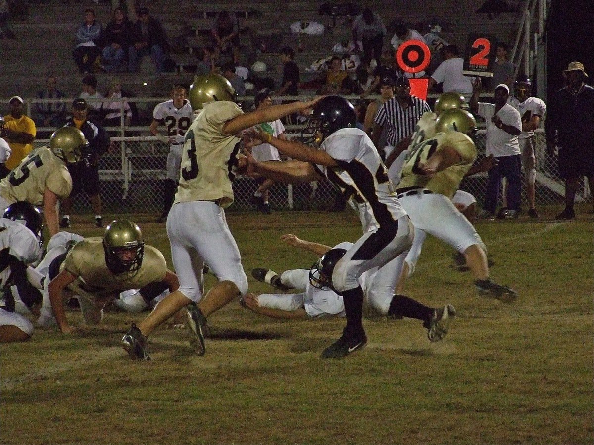 Image: Souder and friends — Defensive end Brandon Souder(63) invited his defensive teammates to a party in Itasca’s backfield.