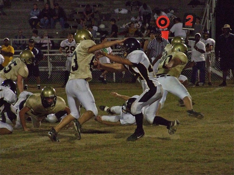 Image: Souder and friends — Defensive end Brandon Souder(63) invited his defensive teammates to a party in Itasca’s backfield.