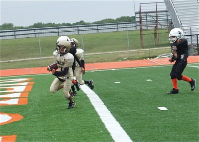 Image: Tylan scores — Tylan Wallace crosses the stripe for 6-points.