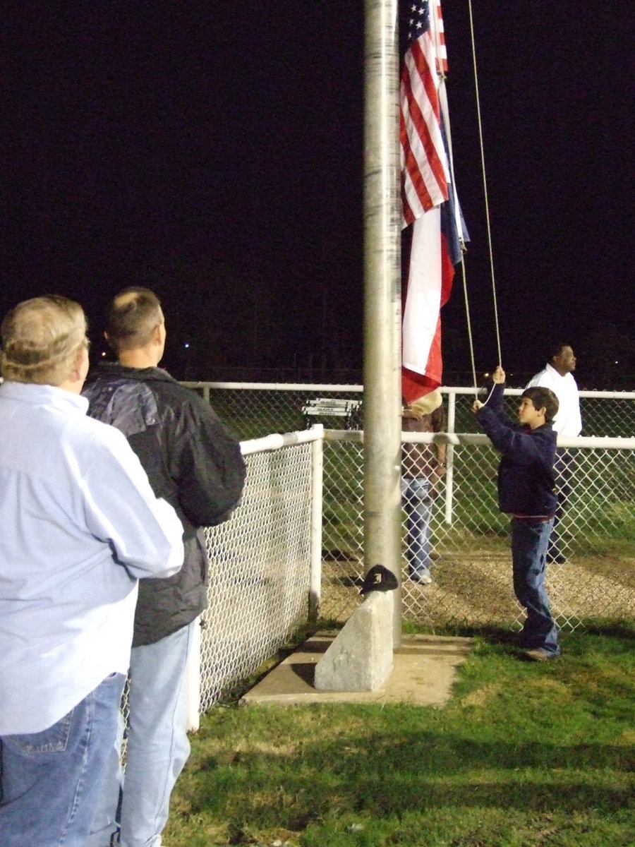 Image: Veterans honored — Local veterans, Earl Goodwin and Paul Cockerham, were honored with a flag raising ceremony before the game. Goodwin served from 1968-1971 in South Vietnam and leaving the Army in 1976. Cockerham served in the Navy 1989-1991. Italy ISD appreciates the sacrifice these men offered to protect our nation and community.