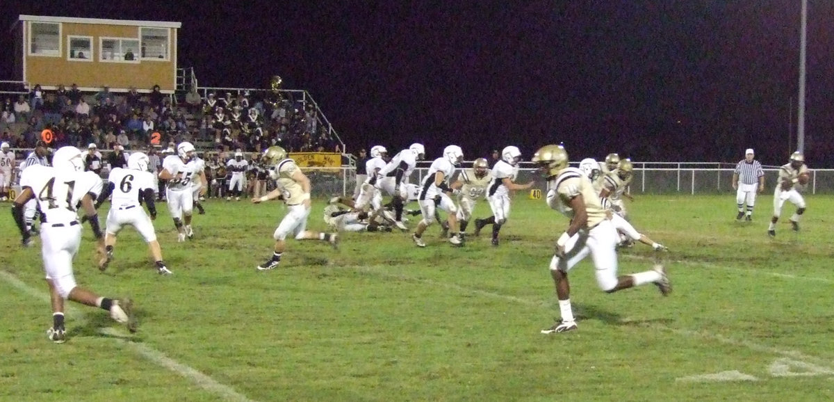 Image: Passing the Jaguars — Italy tries to pass over the Hubbard Jaguars as Jasenio Anderson(10) rolls out looking for tight end Ryan Ashcraft(48) or wide receiver  John Isaac(10). Anderson has completed 75 of 137 passes for 1,331-yards and 19 touchdowns in 6 games.
