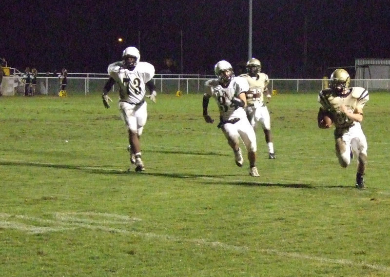 Image: Justin just gets in — Italy halfback, Justin Hayes(36), motors 18-yards for a touchdown.