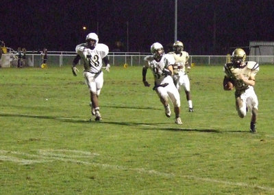 Image: Justin just gets in — Italy halfback, Justin Hayes(36), motors 18-yards for a touchdown.