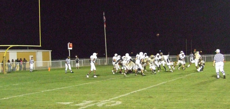 Image: Up and away — Jasenio Anderson kicks the extra point for the Gladiators with Heath Clemons holding. Anderson has made 14 of 23 PATs for 14-points on the season.