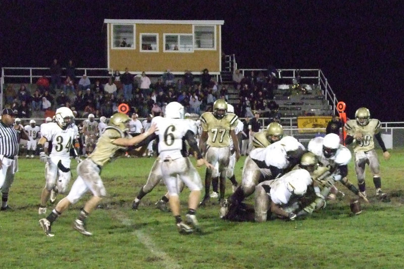 Image: Fumble! — The Gladiators ran into a mass of Jaguars on this play. In 6 games, the Gladiator offense has only fumbled the ball twice in 184 carries.