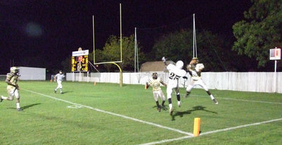 Image: Intercepted — John Isaac picks off the Jaguars before the end of the first half.