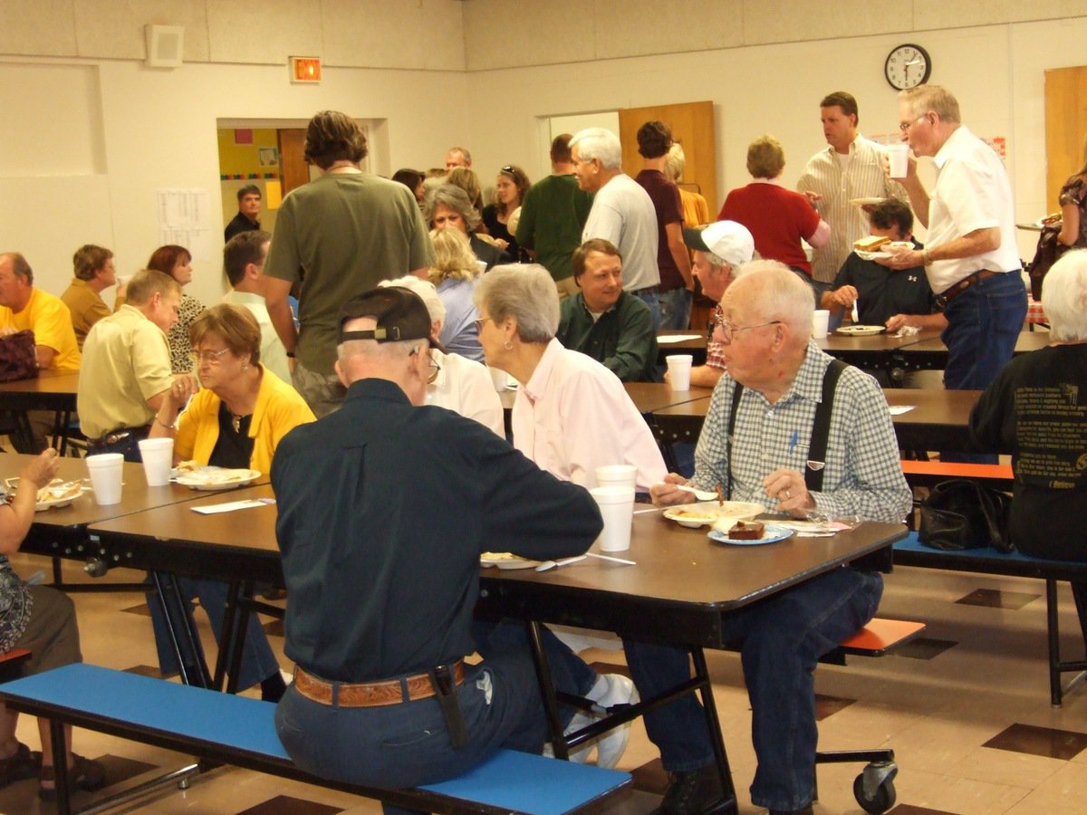 Image: Food and friends — The George E. Scott Memorial Scholarship dinner is also a great opportunity to mingle with neighbors and friends.