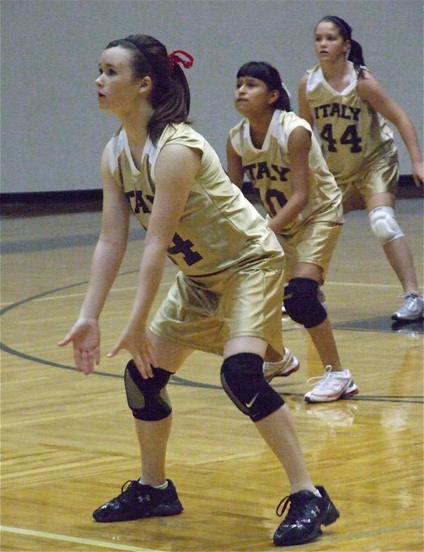 Image: Threetermined — Meagan Hooker, Jessica Garcia and Paige Westbrook had each others back. The 8th grade team finished the 2009 season with a respectable 3-4 record.