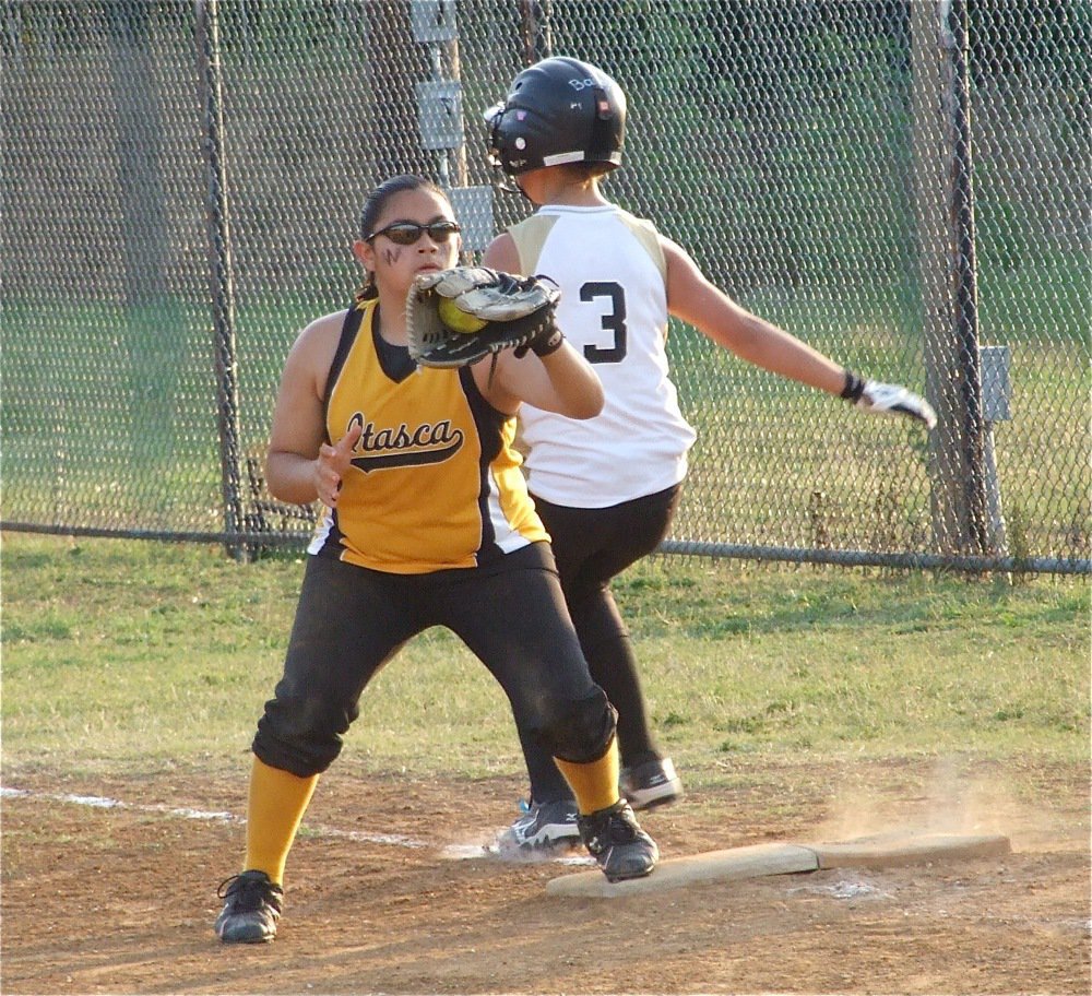 Image: Close play — Itasca made the plays they needed as slap hitter Bailey Eubank can’t quite beat the throw before reaching first base.