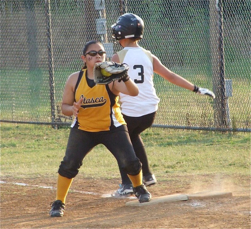 Image: Close play — Itasca made the plays they needed as slap hitter Bailey Eubank can’t quite beat the throw before reaching first base.