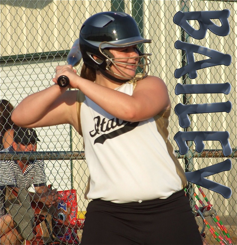 Image: Bailey bats — Bailey DeBorde tries to put one over the Itasca infielders.