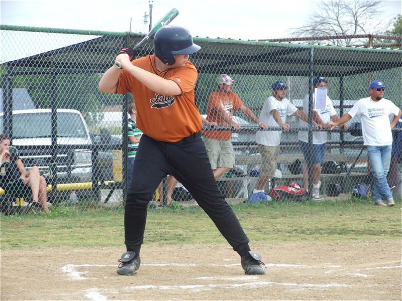 Image: The Intimidator — Aaron Pittmon shifts on his back leg before the pitch.
