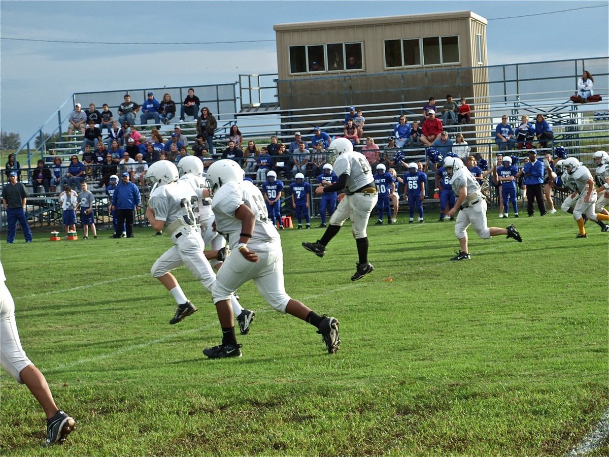 Image: And there’s the kick — Kevin Roldan(64) kicks to Frost to get district underway.