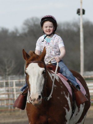 Image: Sadie and Special — Sadie Hinz of Italy was all smiles aboard her horse Special.