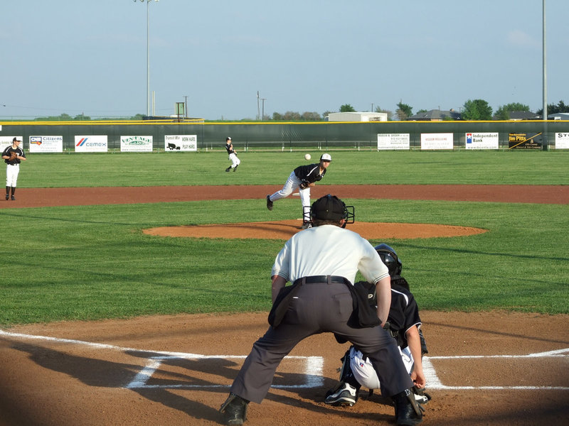 Image: Rapid fire — Caden Jacinto warms up with Ross Stiles before the game. The Gladiator JV team hosted the Red Oak Life Mustangs on Monday night.