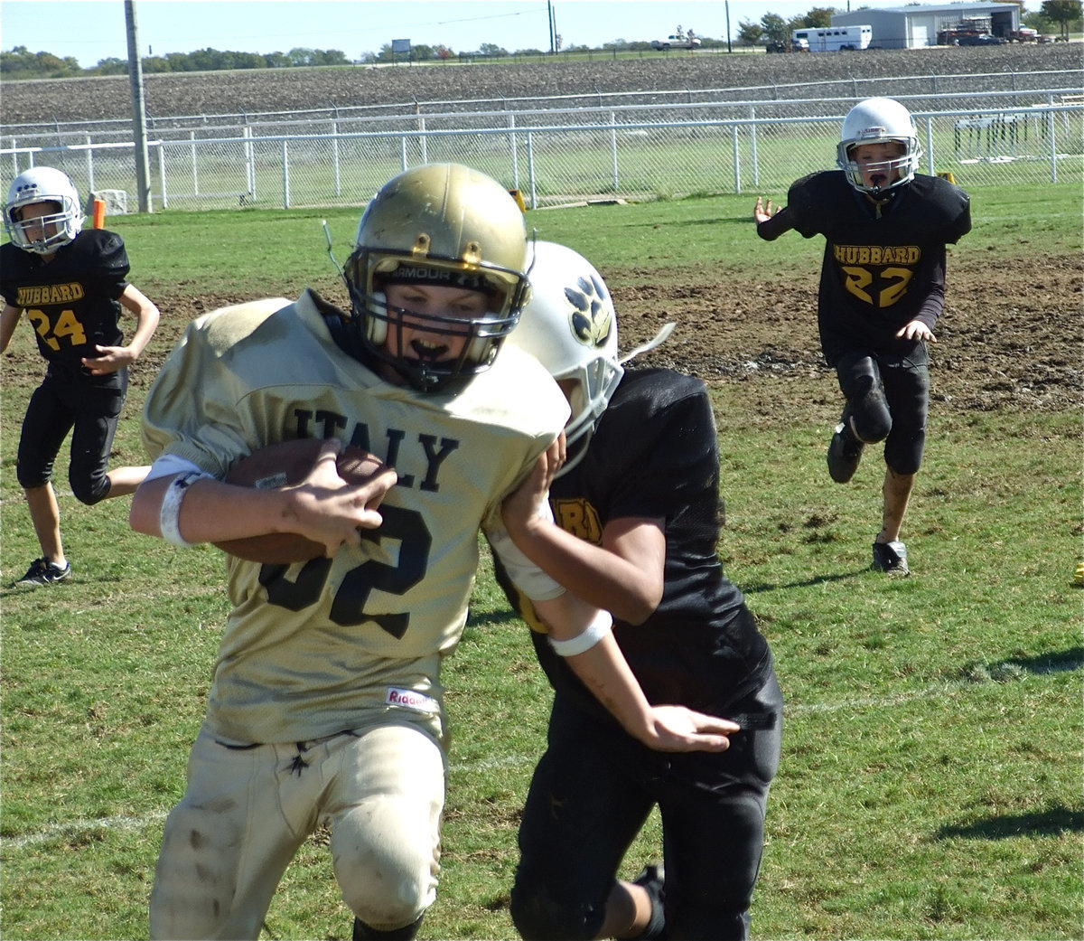 Image: Maynard scrambles — Austin Maynard advances the ball down the sideline.