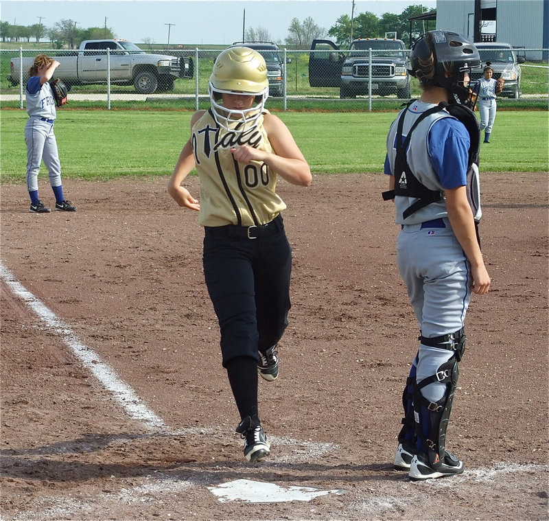 Image: Tate touches home — Mary Tate scores for the Lady Gladiators.