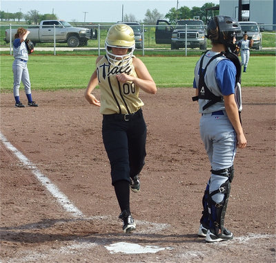 Image: Tate touches home — Mary Tate scores for the Lady Gladiators.