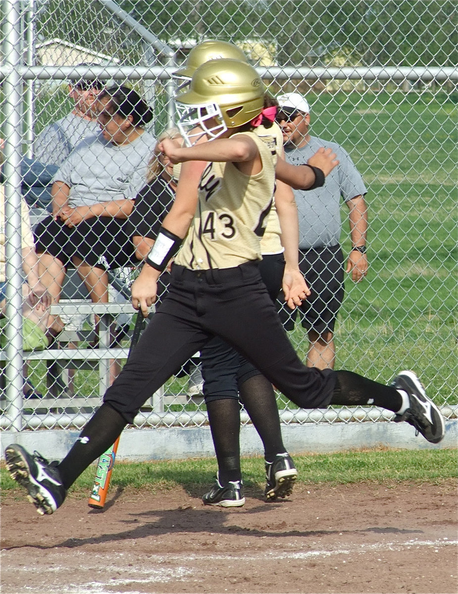 Image: Anna leaps home — Anna Viers scored 4 times against Frost.