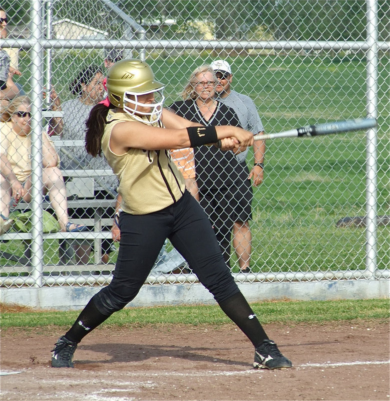 Image: Strong at bat — Alyssa Richards(24) gets all of that one.
