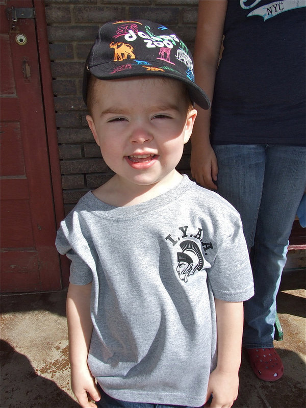 Image: Look at my shirt — Gared Wood sports his new custom printed IYAA shirt he received during the Game On Athletics grand opening.