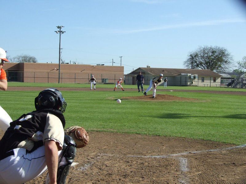 Image: Caden warms up — Freshman pitcher, Caden Jacinto, warms up, along with junior catcher, Ryan Ashcraft. The Gladiators took on the Avalon Eagles and the Grand Prairie Advantage Eagles in district play.