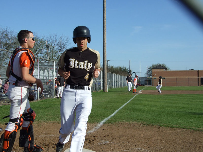 Image: Oscar scores — Oscar Gonzalez scores during the top of the 2nd inning.