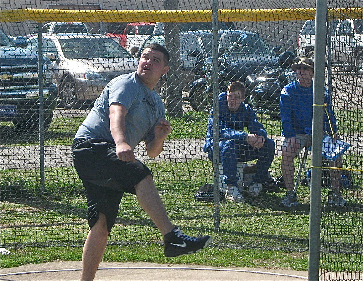 Image: Ross Enriquez — Ross competes in the discus.