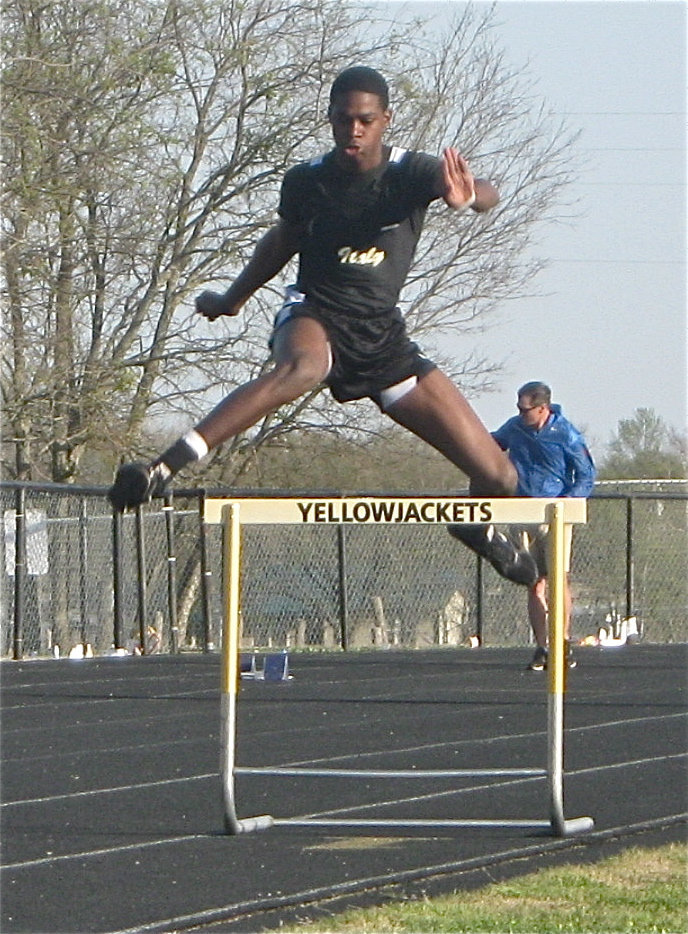 Image: Devonta Simmons — Devonta hurdles an obstacle.