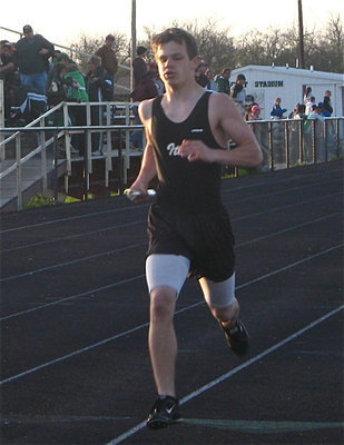 Image: Hamilton keeps going — Chase Hamilton keeps pace during the relay.