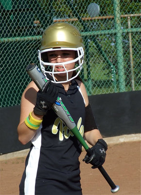 Image: Looking ahead — Senior Drew Windham checks with the dugout before going up to the plate.
