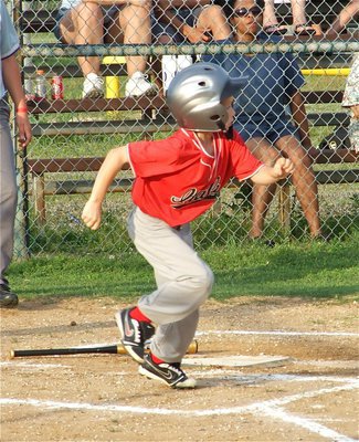 Image: It’s going… — And with one mighty swing the race to first is on!