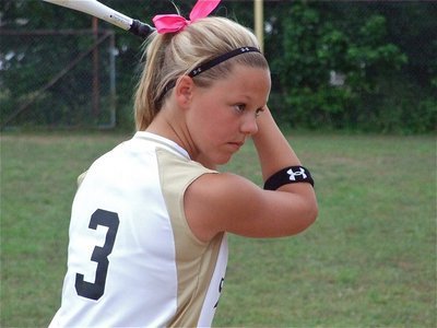 Image: Eyeing the competition — Bailey Eubank times out her swing against Itasca’s pitcher before the game.