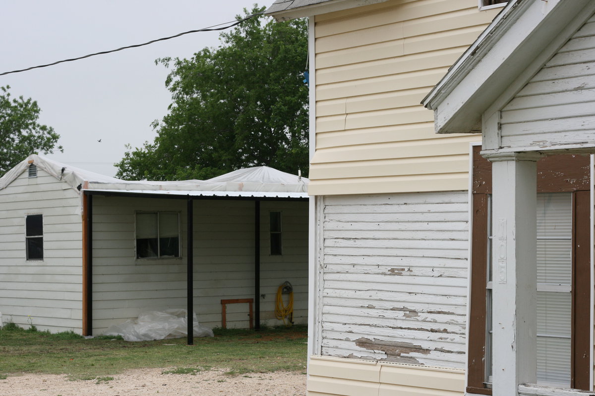 Image: Siding ripped from homes