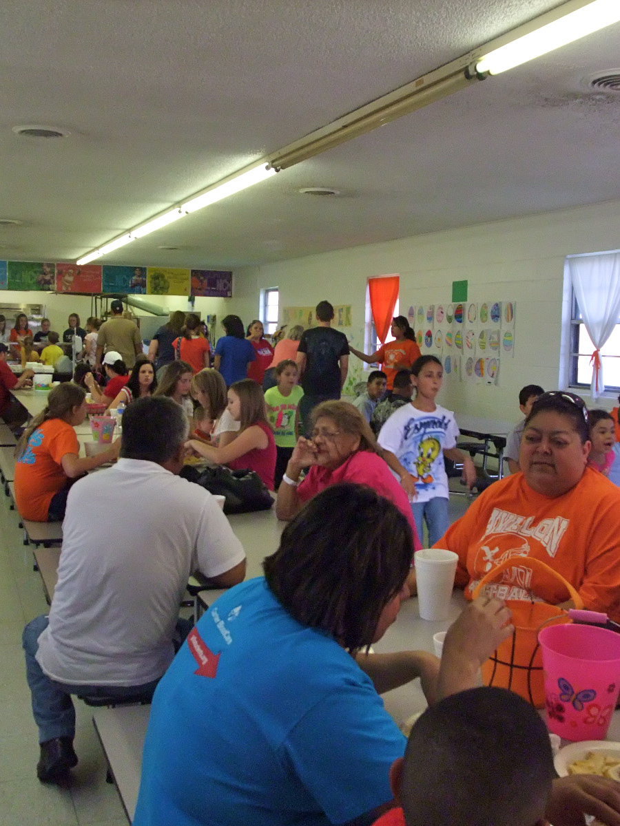 Image: Happy diners — The cafeteria was packed with hungry parents and kids.