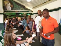 Image: Jasenio Anderson attends FCA All-Star Victory Banquet in Waco — Italy High School Gladiator, Jasenio Anderson, checks in with his family inside the Baylor Ferrell Center before making their way into Paul J. Meyer Arena to enjoy the FCA (Fellowship of Christian Athletes) All-Star Victory Banquet.