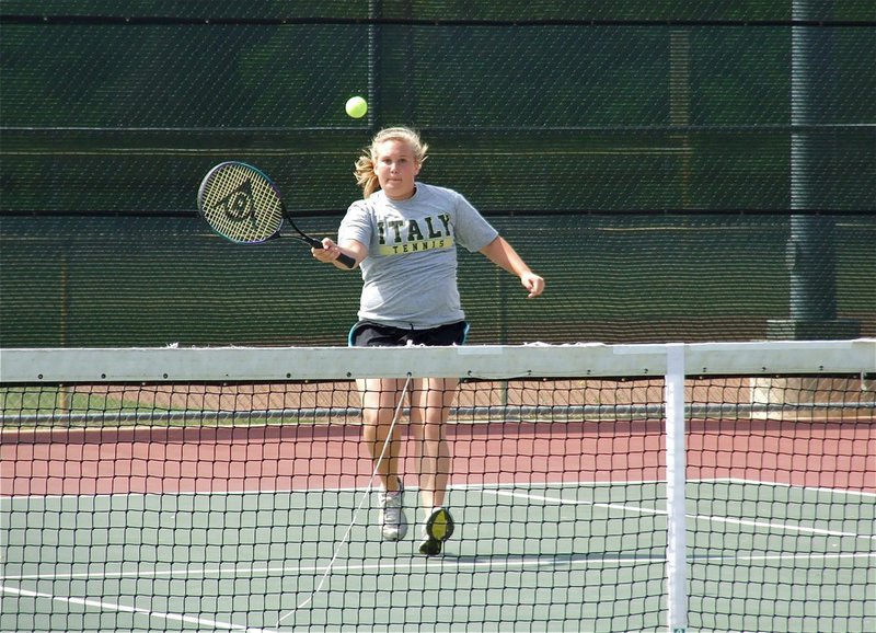 Image: Drenda on the attack — Moving in for the point is Italy’s Drenda Burk.