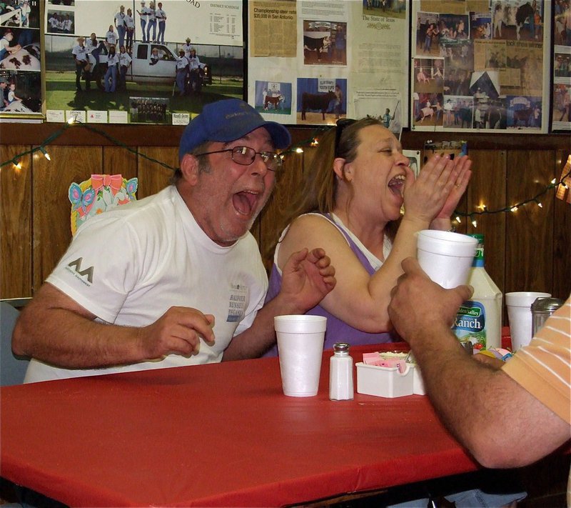 Image: Comedy dinner — Mark Souder, Sr. and his wife Kristi enjoy the auction turned “Celebrity Roast” as Doug Nelson takes a friendly jab at Larry Eubank.