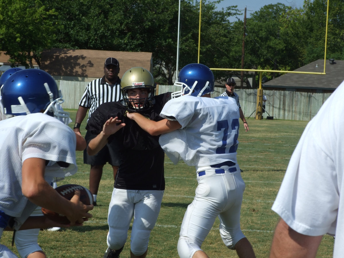 Image: Zach on the attack — Italy’s, Zachary Latimer, applies pressure on the Blooming Grove backfield.